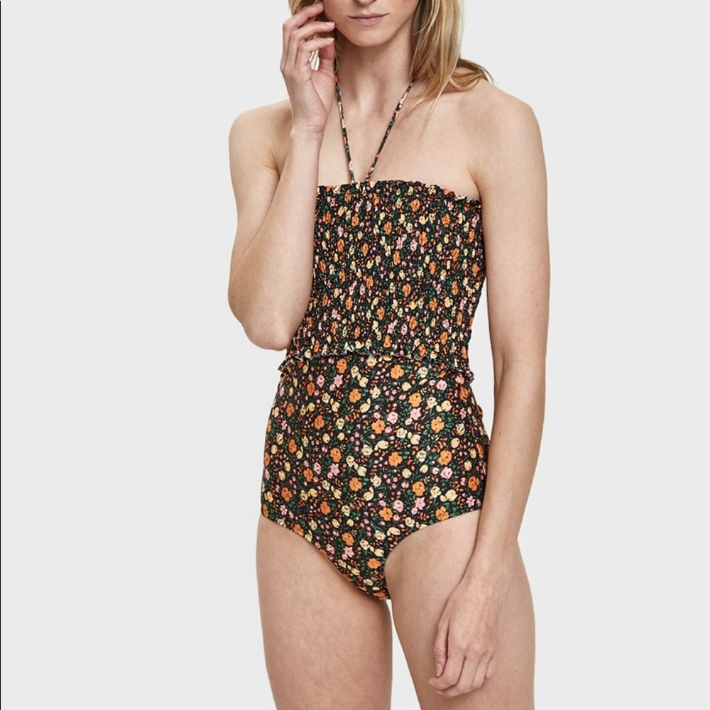 GANNI
Ipanema shirred floral-print halterneck swimsuit in size L